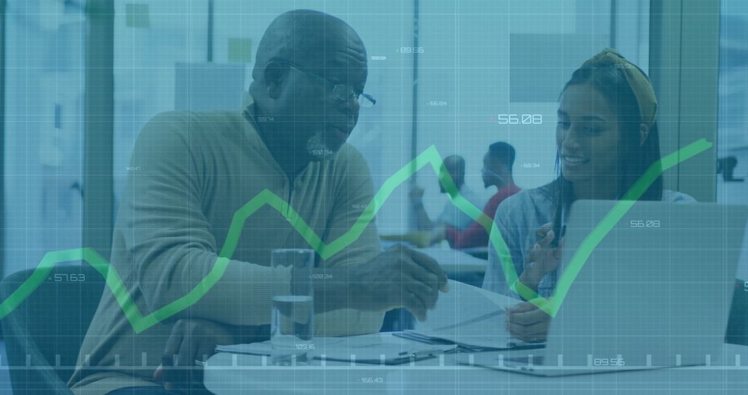 Diverse Team Analyzing Financial Data Trends in Dynamic Office