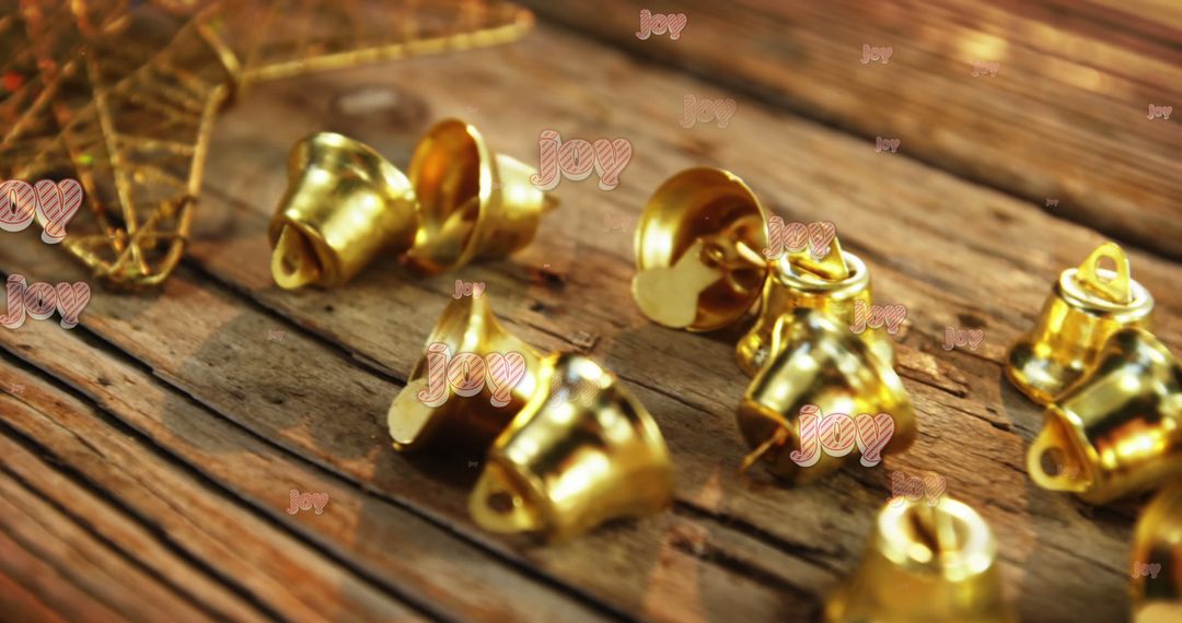 Rustic Christmas Bells with Joyful Messages on Wooden Surface