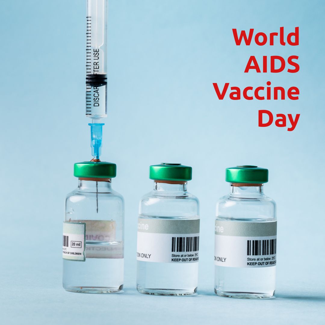 World AIDS Vaccine Day Concept with Vaccine Vials and Syringe