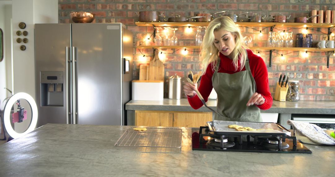 Home Baker Preparing Cookies on Rustic Kitchen Island with Brick Wall and Warm Lights