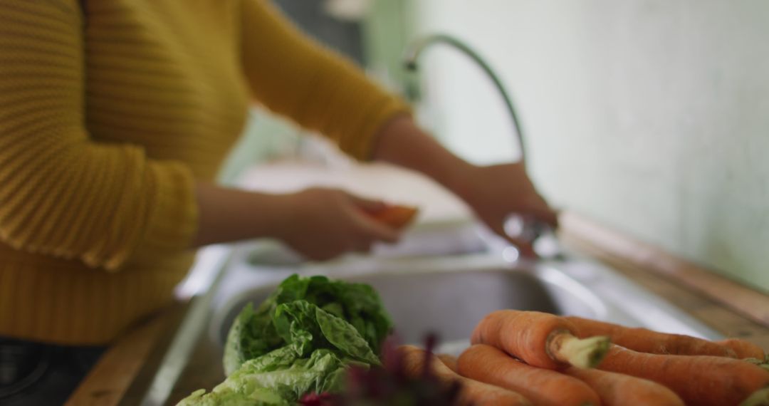 Close-up of Person Washing Fresh Vegetables in Kitchen - Free Images, Stock Photos and Pictures on Pikwizard.com