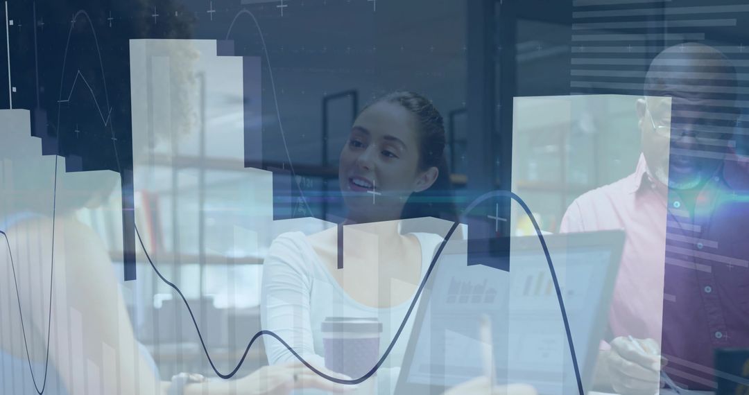 Business Team Analyzing Data Graphs in Modern Office Setting