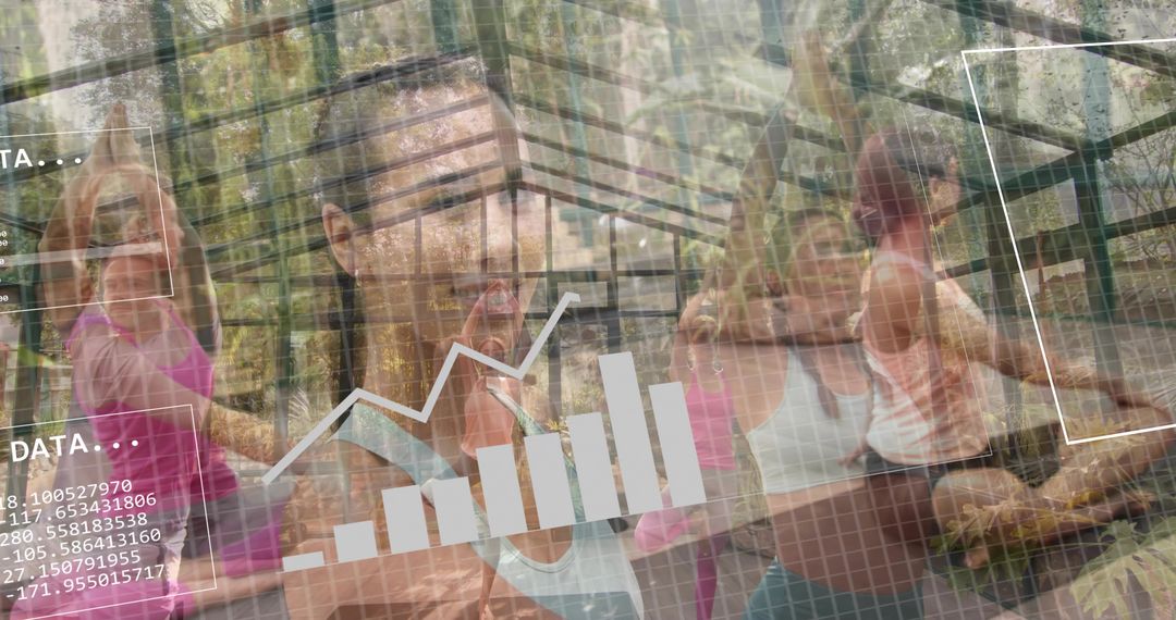Practicing group yoga inside glass greenhouse with fitness data overlay for wellness
