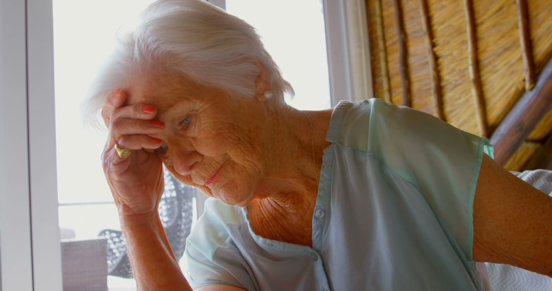 Senior Woman Feeling Upset in Home - Free Images, Stock Photos and Pictures on Pikwizard.com