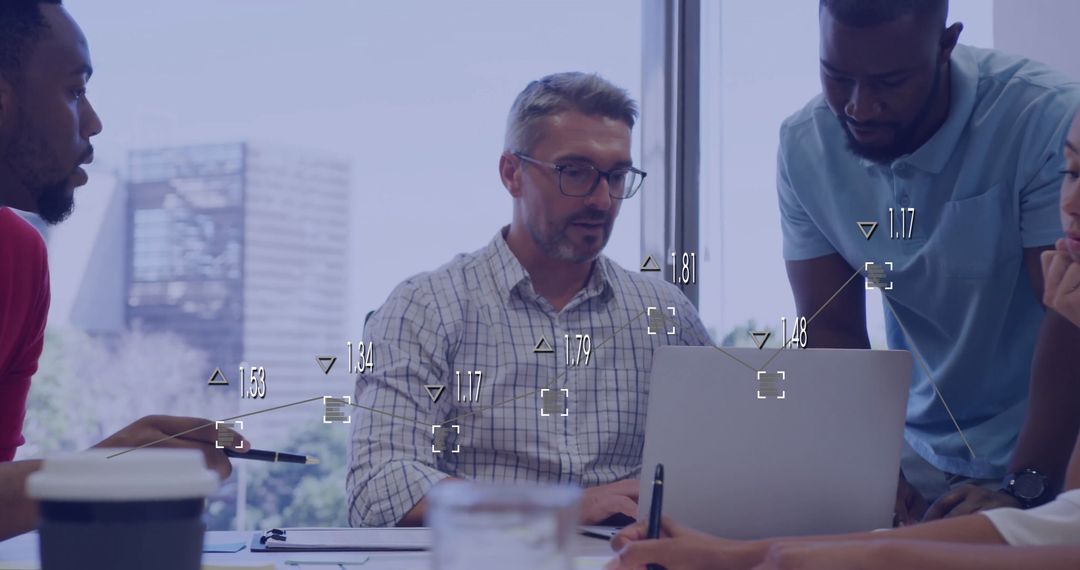 Team Collaborating on Digital Data Analysis Project