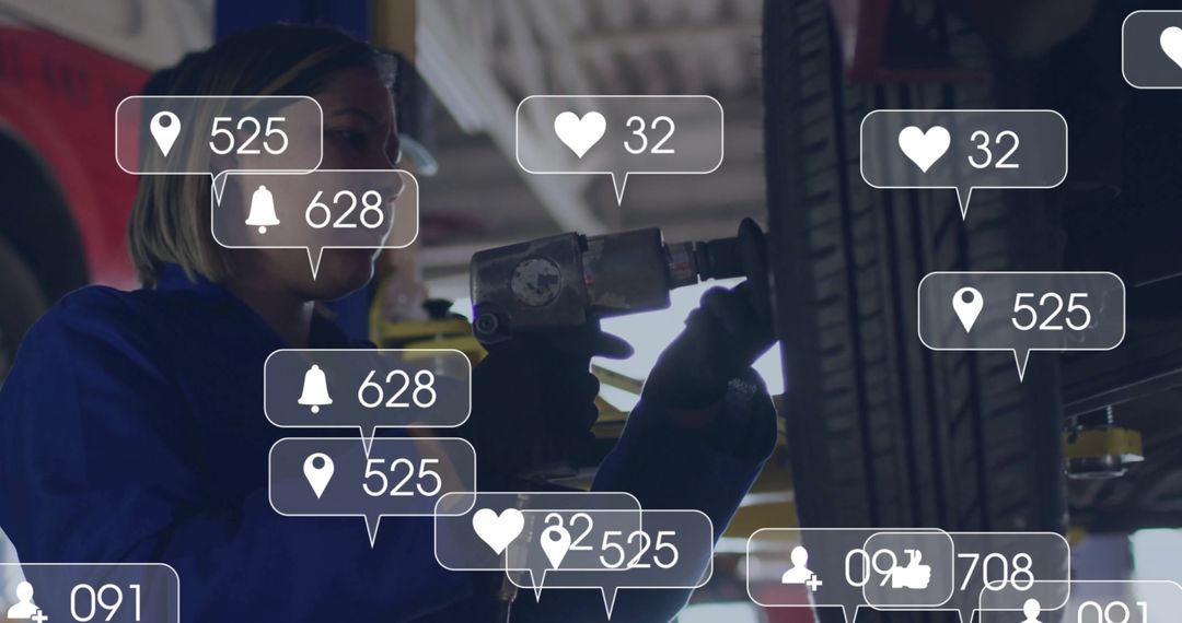 Mechanic Using Impact Wrench with Overlayed Notifications