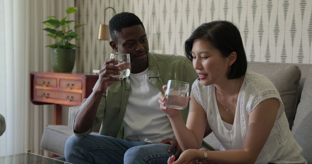 Multicultural Friends Having Relaxed Conversation at Home