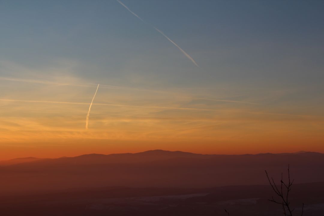 Soothing Sunset Over Misty Mountain Range - Free Images, Stock Photos and Pictures on Pikwizard.com