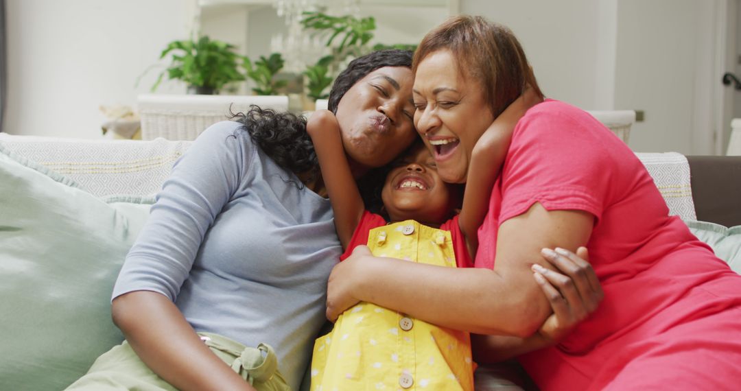 Happy Multigenerational African American Family Hugging at Home - Free Images, Stock Photos and Pictures on Pikwizard.com