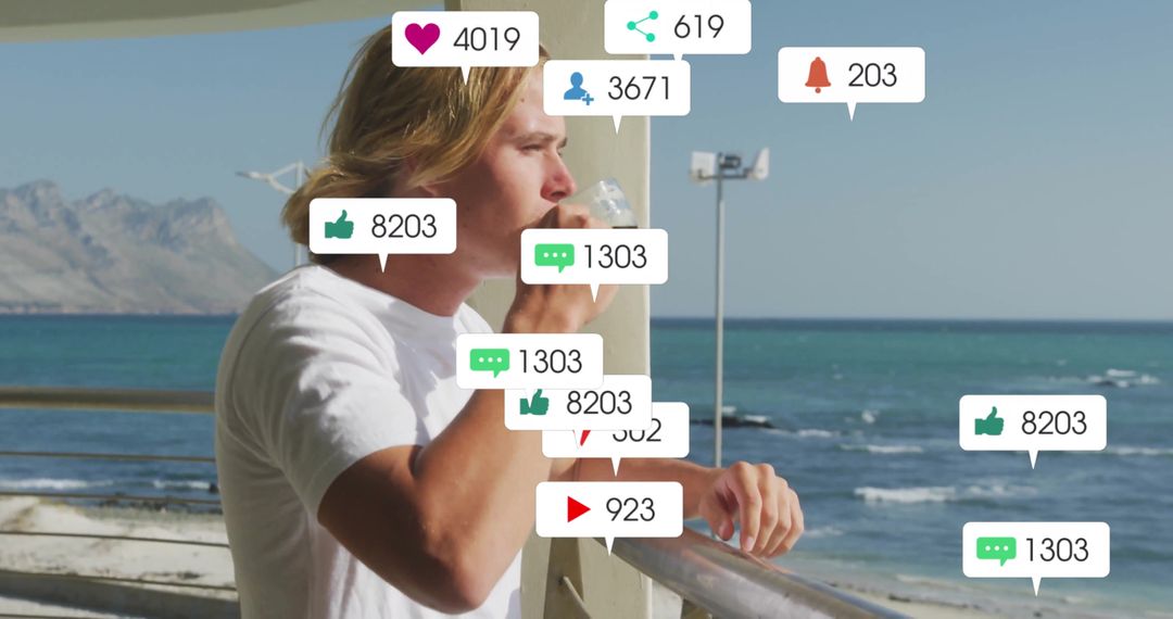 Young Man Enjoying Beach Views with Social Media Interaction