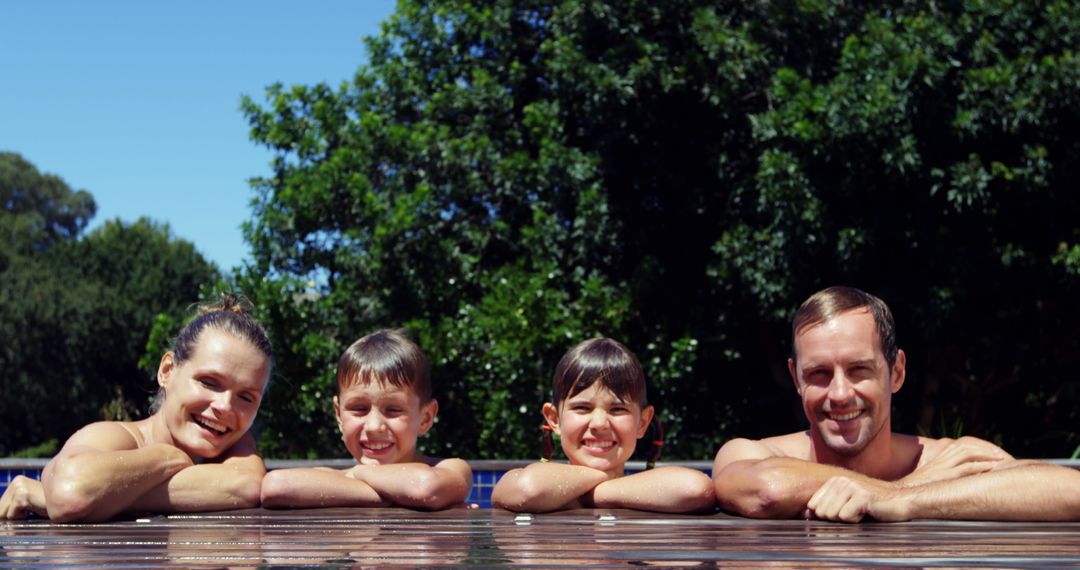 Family Spending Leisure Time in Swimming Pool on Sunny Day - Free Images, Stock Photos and Pictures on Pikwizard.com