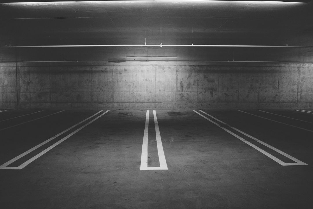 Empty Underground Parking Lot with Concrete Walls - Free Images, Stock Photos and Pictures on Pikwizard.com