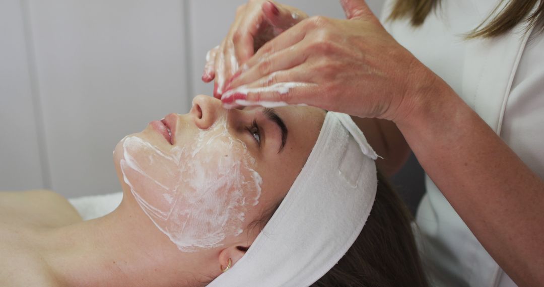 Woman Receiving Relaxing Facial Treatment at Spa - Free Images, Stock Photos and Pictures on Pikwizard.com