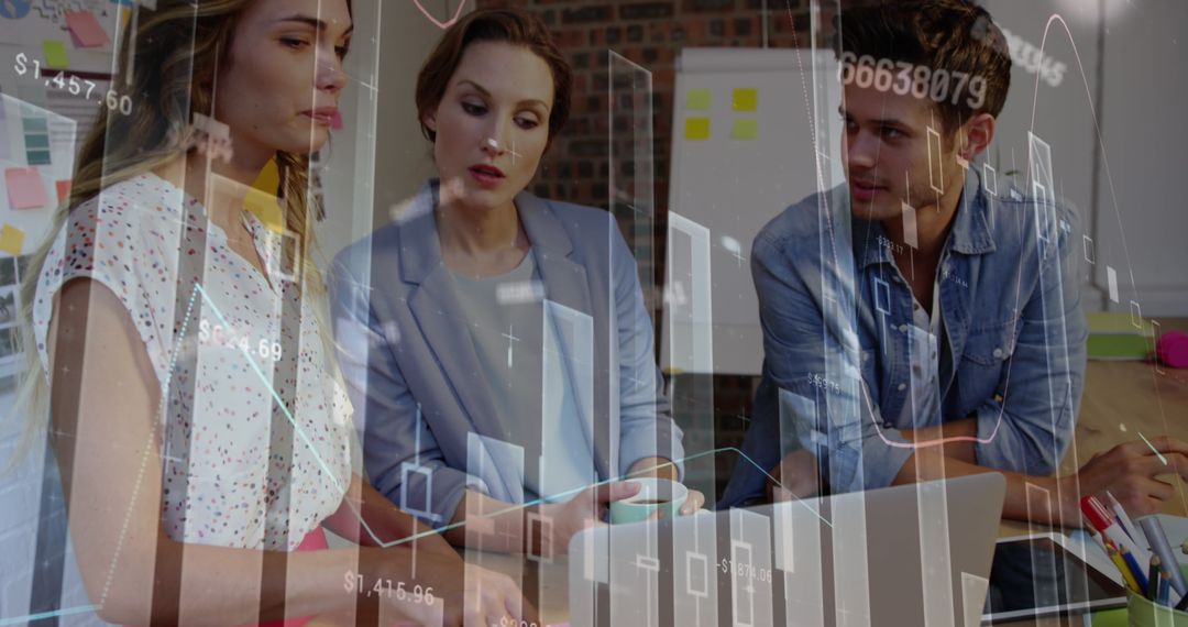 Diverse Business Team Analyzing Financial Data at Meeting