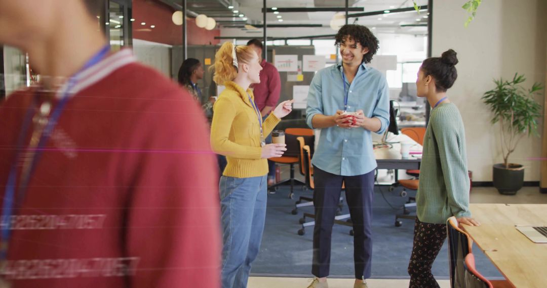 Diverse Team Enjoying Coffee Break in Modern Workspace