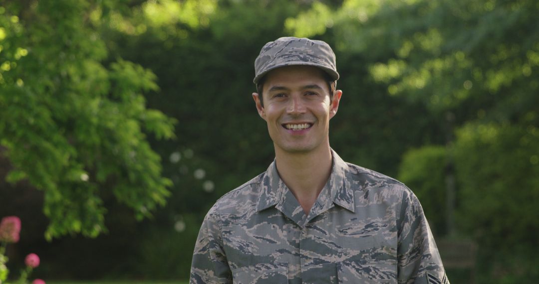 Smiling Caucasian Soldier in Lush Garden