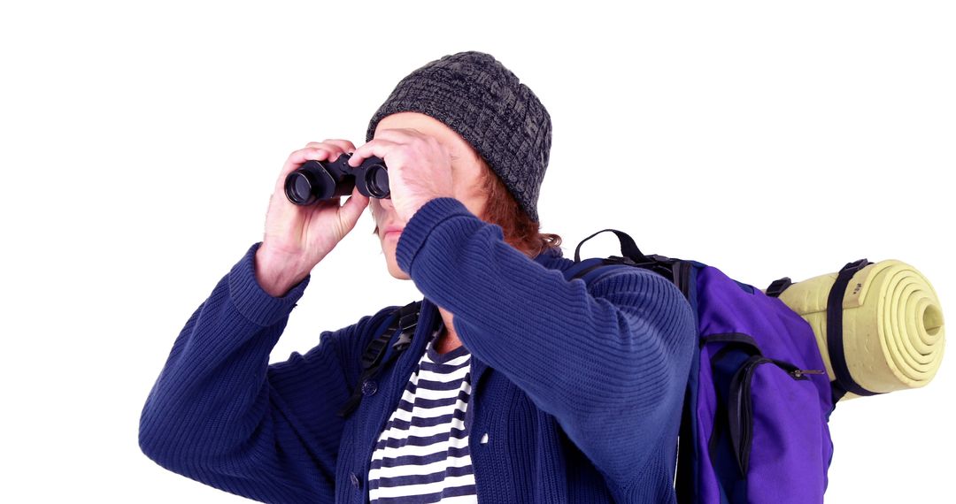 Explorer Using Binoculars with Outdoor Gear and Backpack