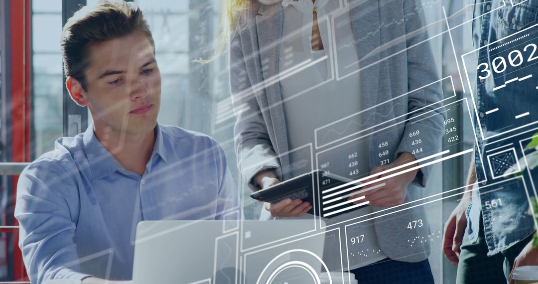 Professionals Collaborating with Digital Data in Office Space