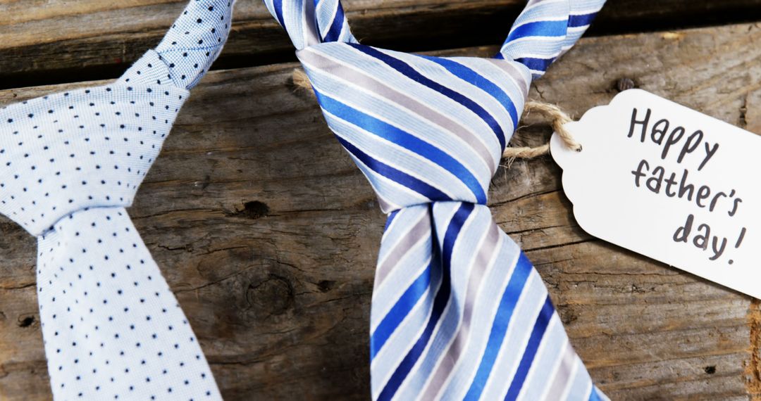 Father's Day Greeting with Ties on Wooden Background - Free Images, Stock Photos and Pictures on Pikwizard.com