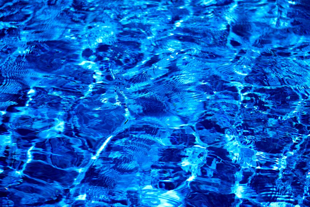Bright Blue Pool Water with Sunlight Reflections - Free Images, Stock Photos and Pictures on Pikwizard.com