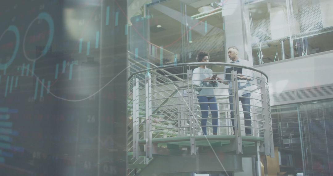 Diverse Business Professionals Collaborating with Financial Data in Modern Office