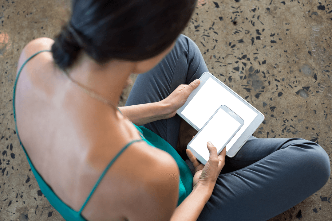 Transparent Communication: Woman Multitasking With Devices in Office