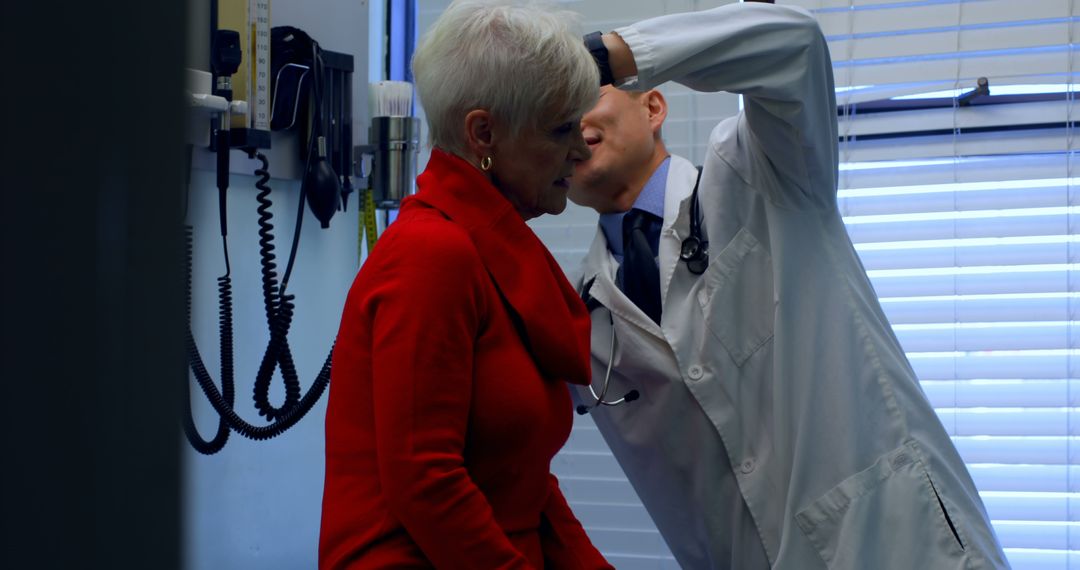 Senior Woman Receiving Ear Examination from Doctor in Medical Clinic - Free Images, Stock Photos and Pictures on Pikwizard.com