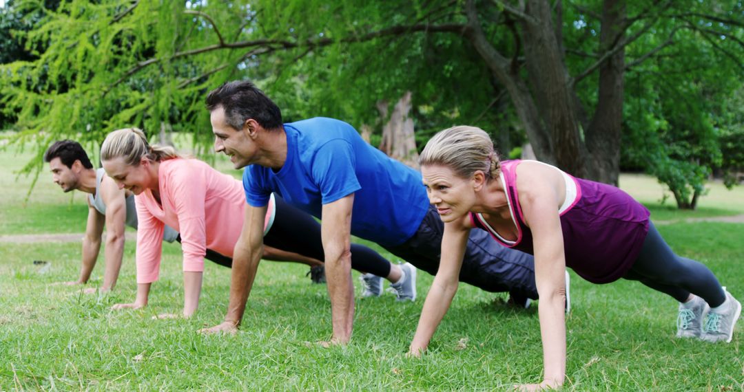 Group Fitness Training in Park Performing Push-Ups - Free Images, Stock Photos and Pictures on Pikwizard.com