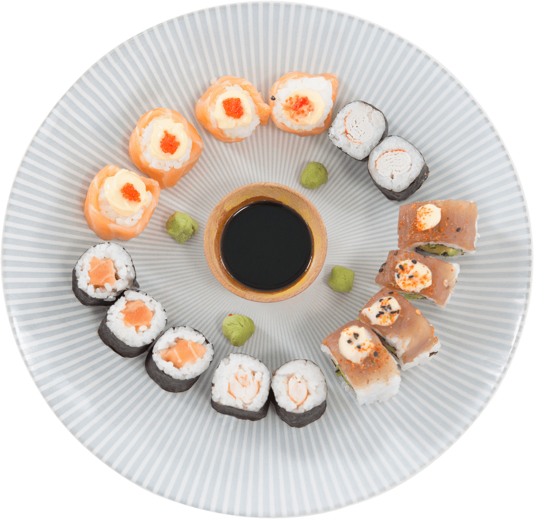 Assorted Sushi with Dipping Sauce on Transparent Plate Artfully Arranged