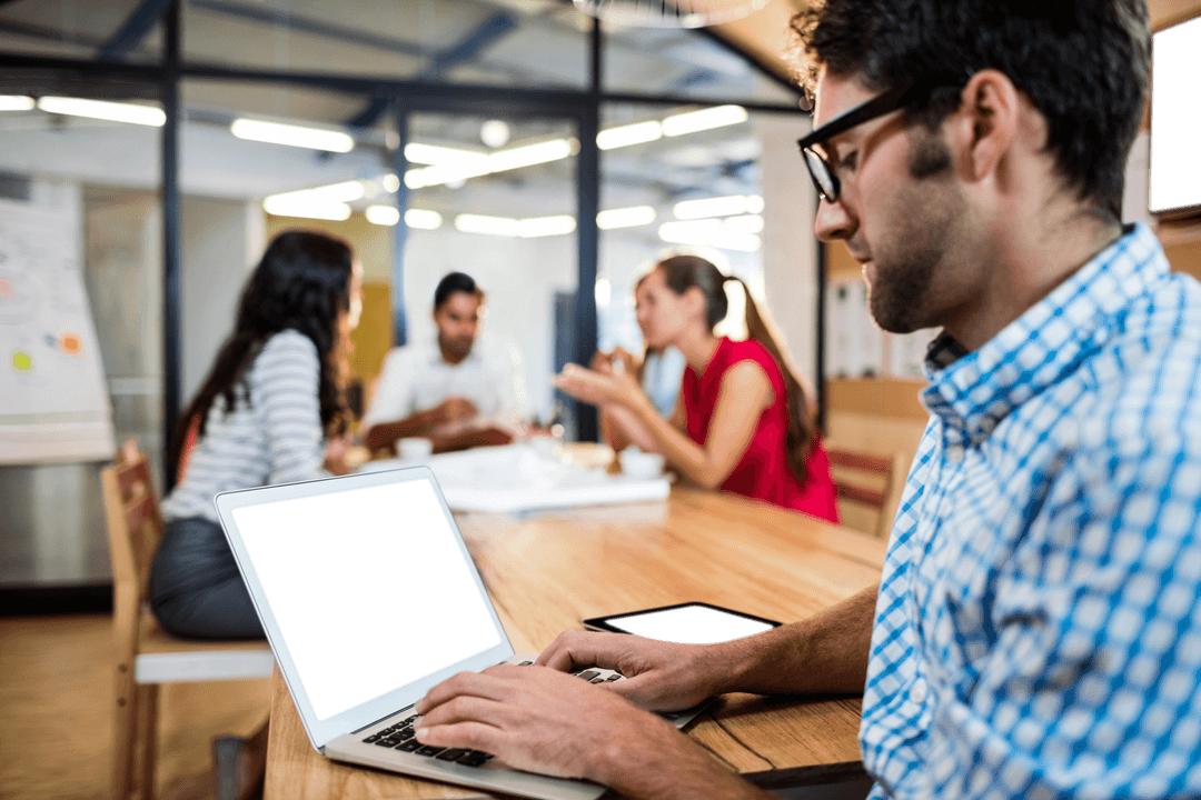 Transparent Background Man Typing in Office Setting with Coworkers