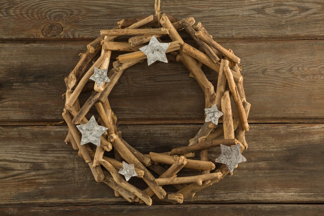 Rustic Christmas Wreath on Wooden Plank - Free Images, Stock Photos and Pictures on Pikwizard.com