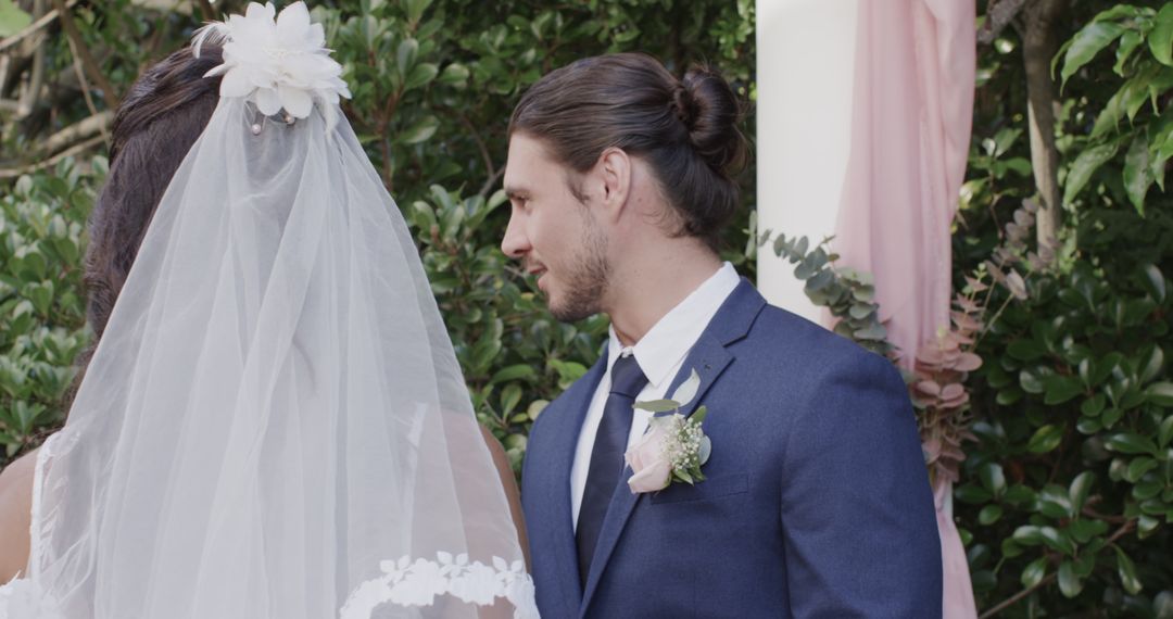 Bride and Groom Having Emotional Outdoor Wedding Ceremony