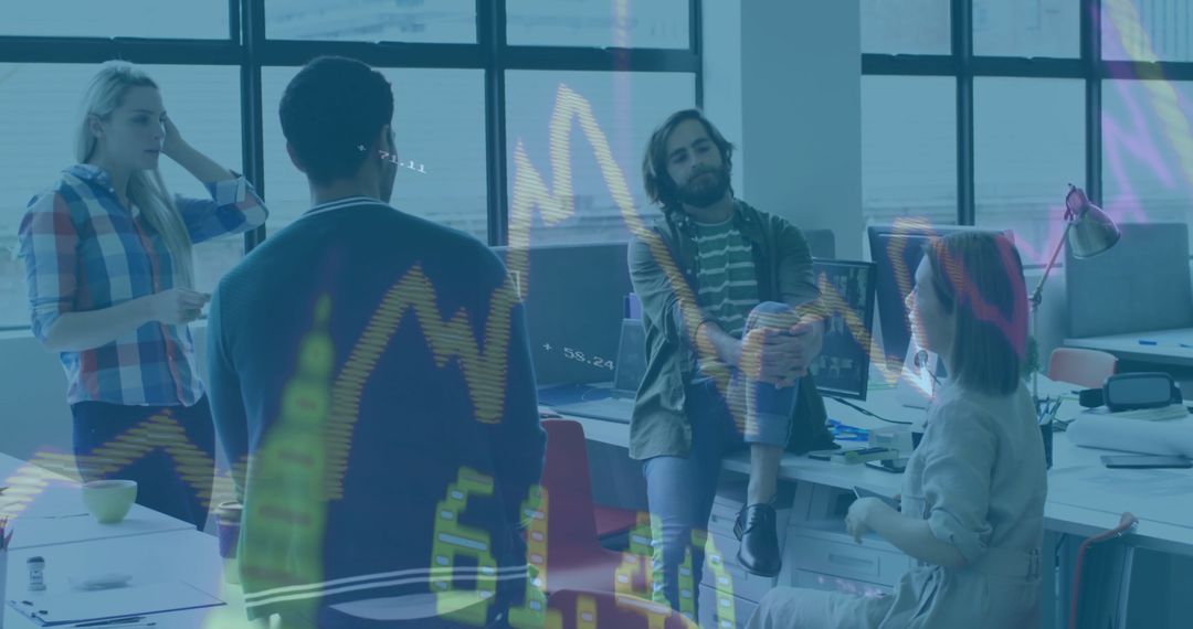 Collaborative Colleagues Analyzing Data in Modern Office Setting