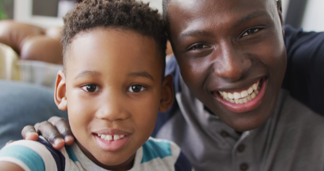 Image of happy african american father and son taking selfie - Free Images, Stock Photos and Pictures on Pikwizard.com