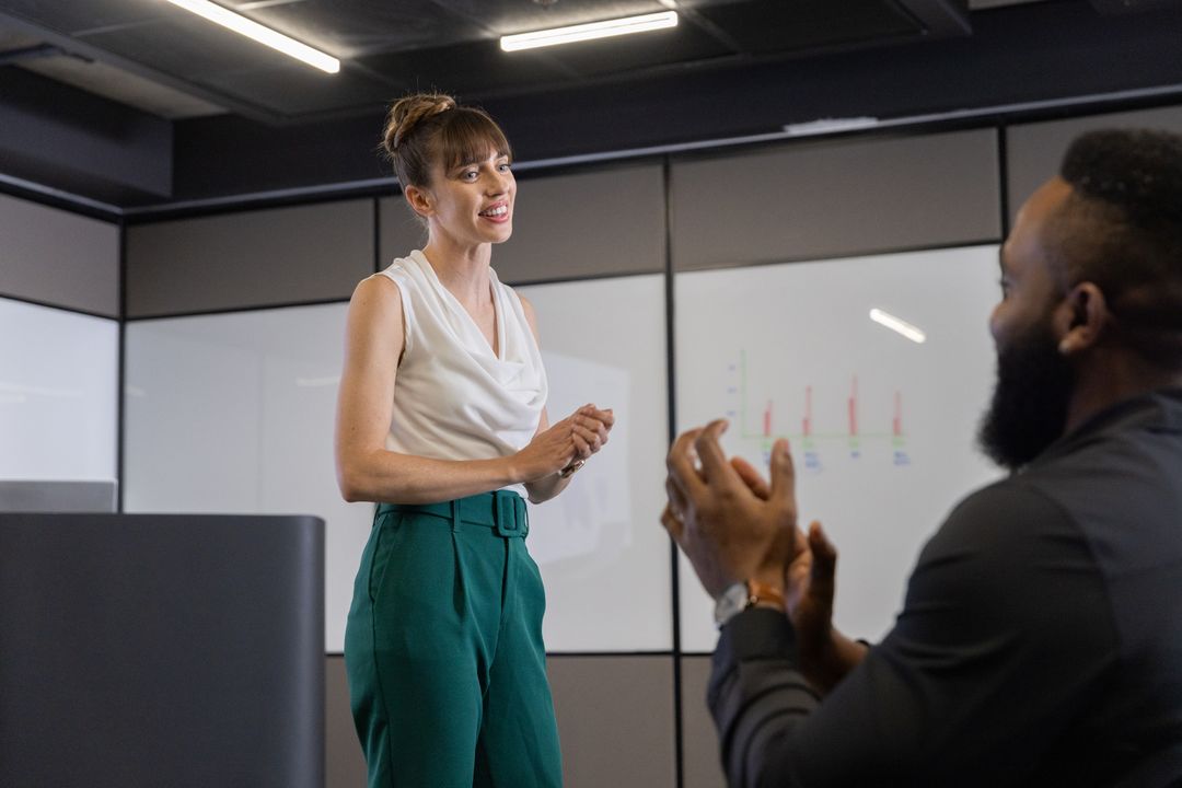 Businesswoman Presenting in Modern Office Meeting Room