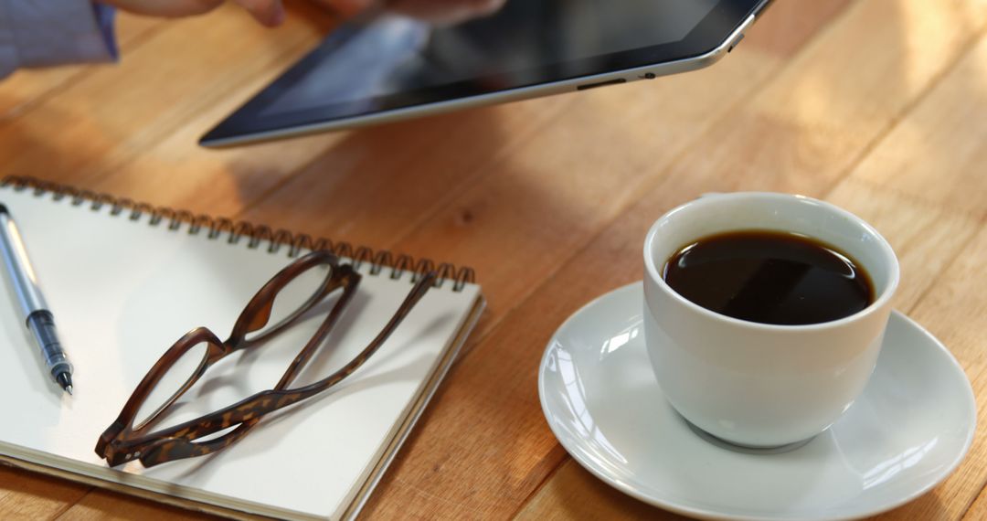 Close-Up of Coffee, Glasses, Notebook and Tablet on Wooden Desk - Free Images, Stock Photos and Pictures on Pikwizard.com