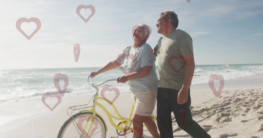 Senior Couple Enjoying Relaxing Beach Walk with Yellow Bicycle