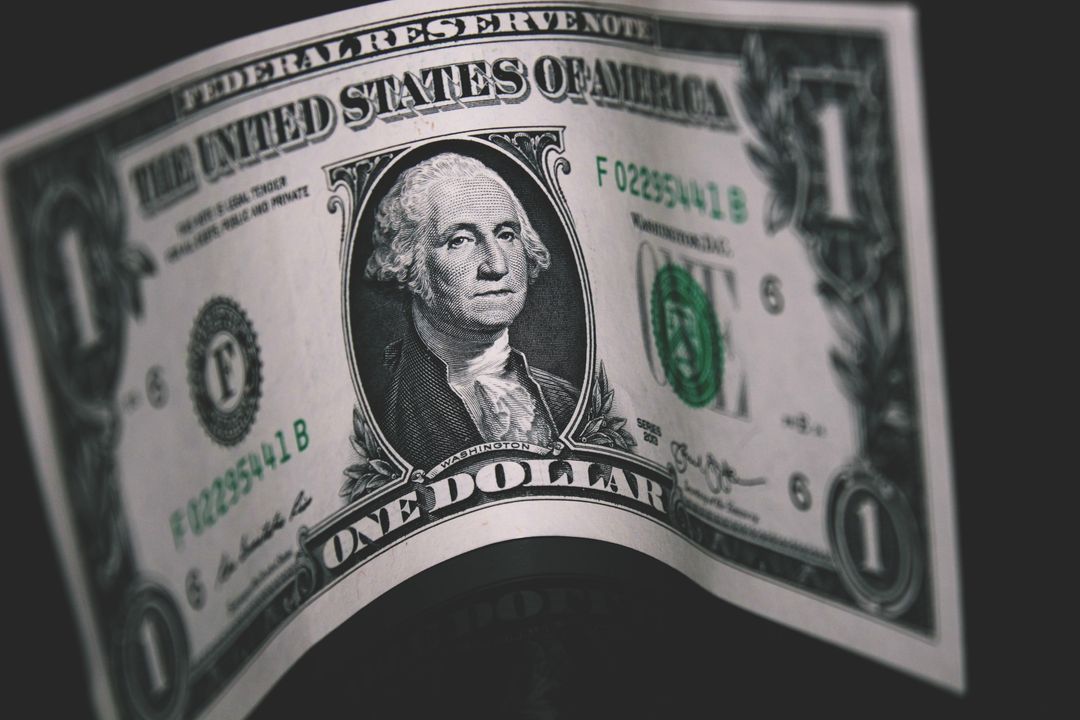 Close-up of One Dollar Bill with Dark Background