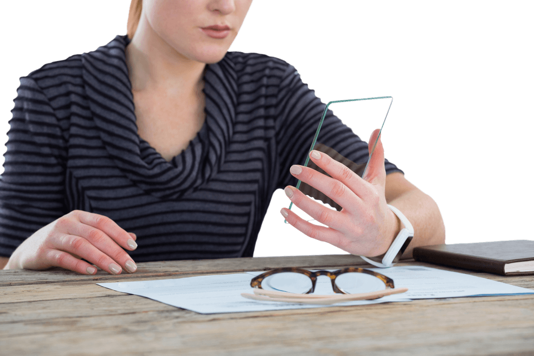 Businesswoman Using Transparent Glass Interface at Office Desk