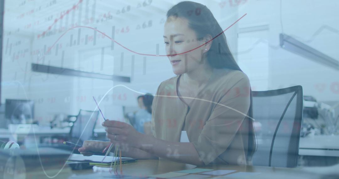 Woman Analyzing Financial Data with Futuristic Virtual Interface