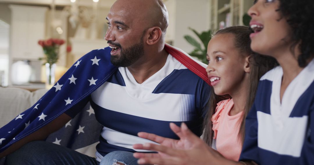 Excited Multiracial Family Watching Sports Event at Home with USA Flag - Free Images, Stock Photos and Pictures on Pikwizard.com