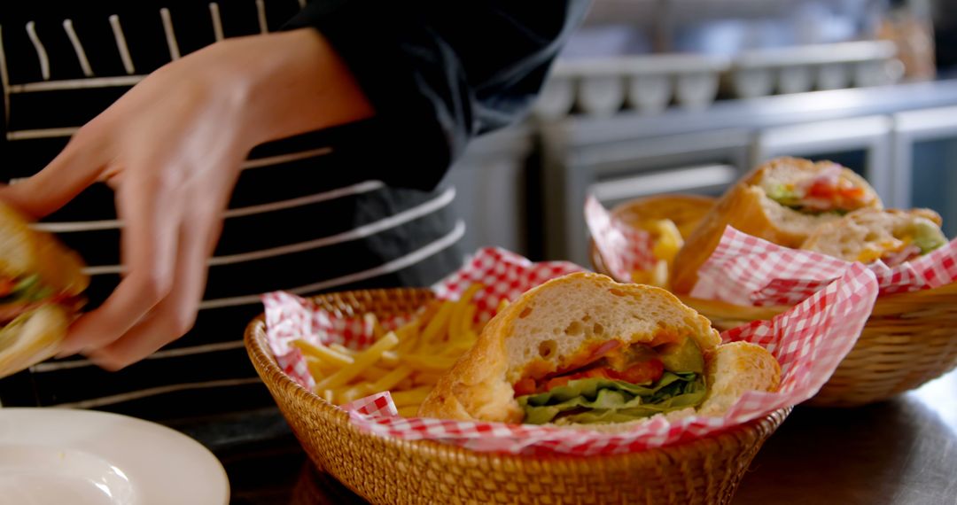 Close-Up of Sandwiches and Fries in Baskets at Deli Counter - Free Images, Stock Photos and Pictures on Pikwizard.com