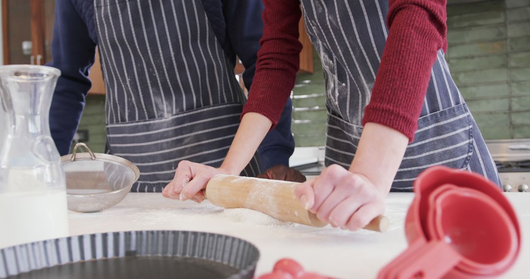 Baking Together in Modern Kitchen with Rolling Pin and Aprons - Free Images, Stock Photos and Pictures on Pikwizard.com