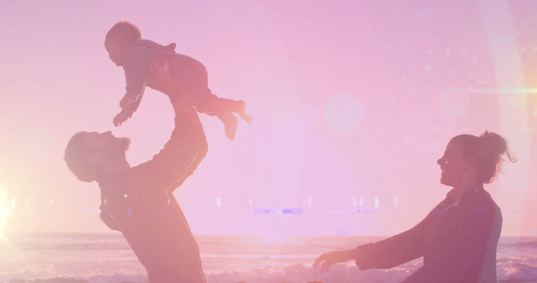 Joyful Family Playing on Beach at Sunset