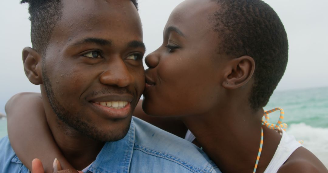 Joyful Couple at Beach Enjoying Memorable Time