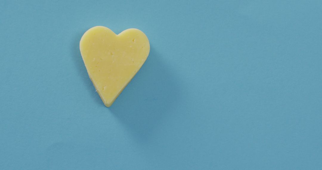 Yellow Heart-Shaped Soap on Light Blue Background - Free Images, Stock Photos and Pictures on Pikwizard.com