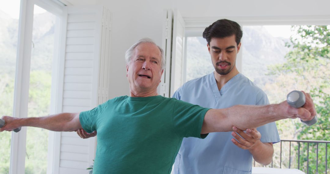 Senior Man Exercising with Physical Therapist at Rehabilitation Center - Free Images, Stock Photos and Pictures on Pikwizard.com