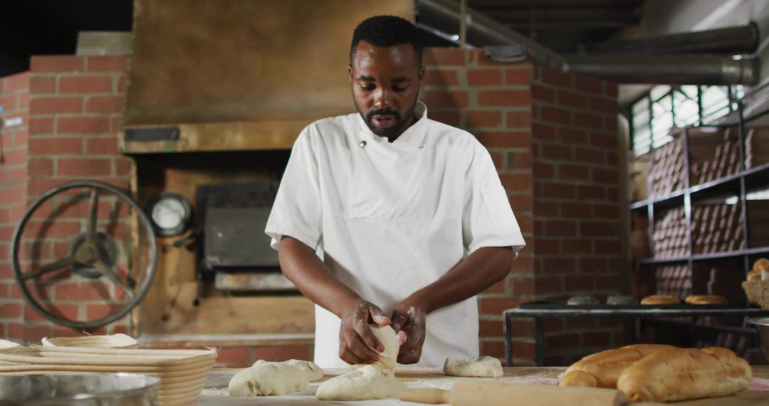 Artisan Baker Shaping Dough at Rustic Brick Oven Bakery, Handcrafted Bread