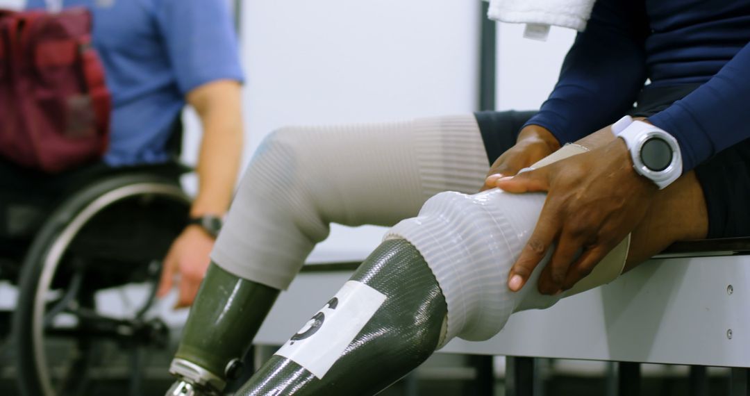 Athlete with Prosthetic Legs Preparing for Sports Challenge - Free Images, Stock Photos and Pictures on Pikwizard.com