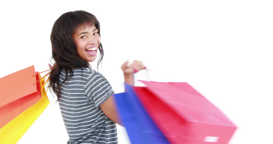 Joyful Woman Enjoying Shopping with Colorful Bags - Free Images, Stock Photos and Pictures on Pikwizard.com